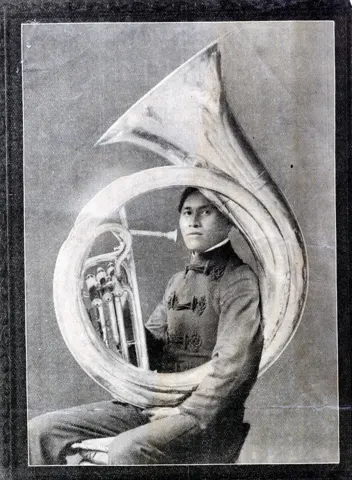 A Chilocco Indian School band musician with his euphonium, June 13, 1905.