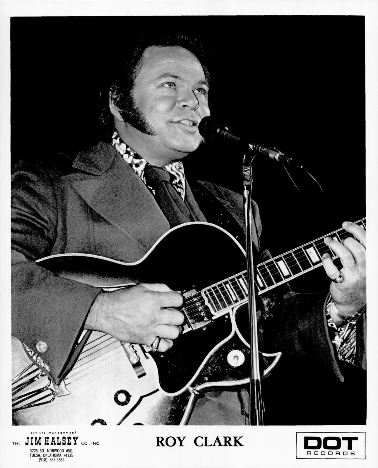 Clark Roy playing guitar.