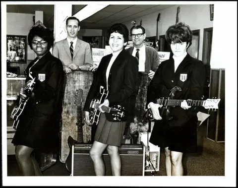 Nancy Smith, Bertha Gascar and Sherry Chambers with guitars at the Guthrie center, 1968.