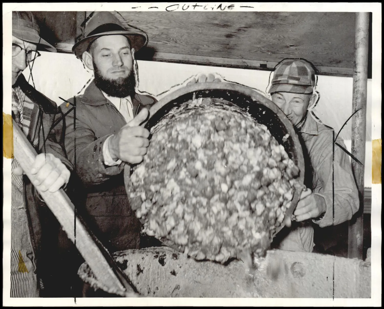 Photograph used for a story in the Daily Oklahoman newspaper. Caption: "A band of Mennonites will close down the Lord's cannery Thursday after preparing 9 tons of Oklahoma beef for the needy around the world."