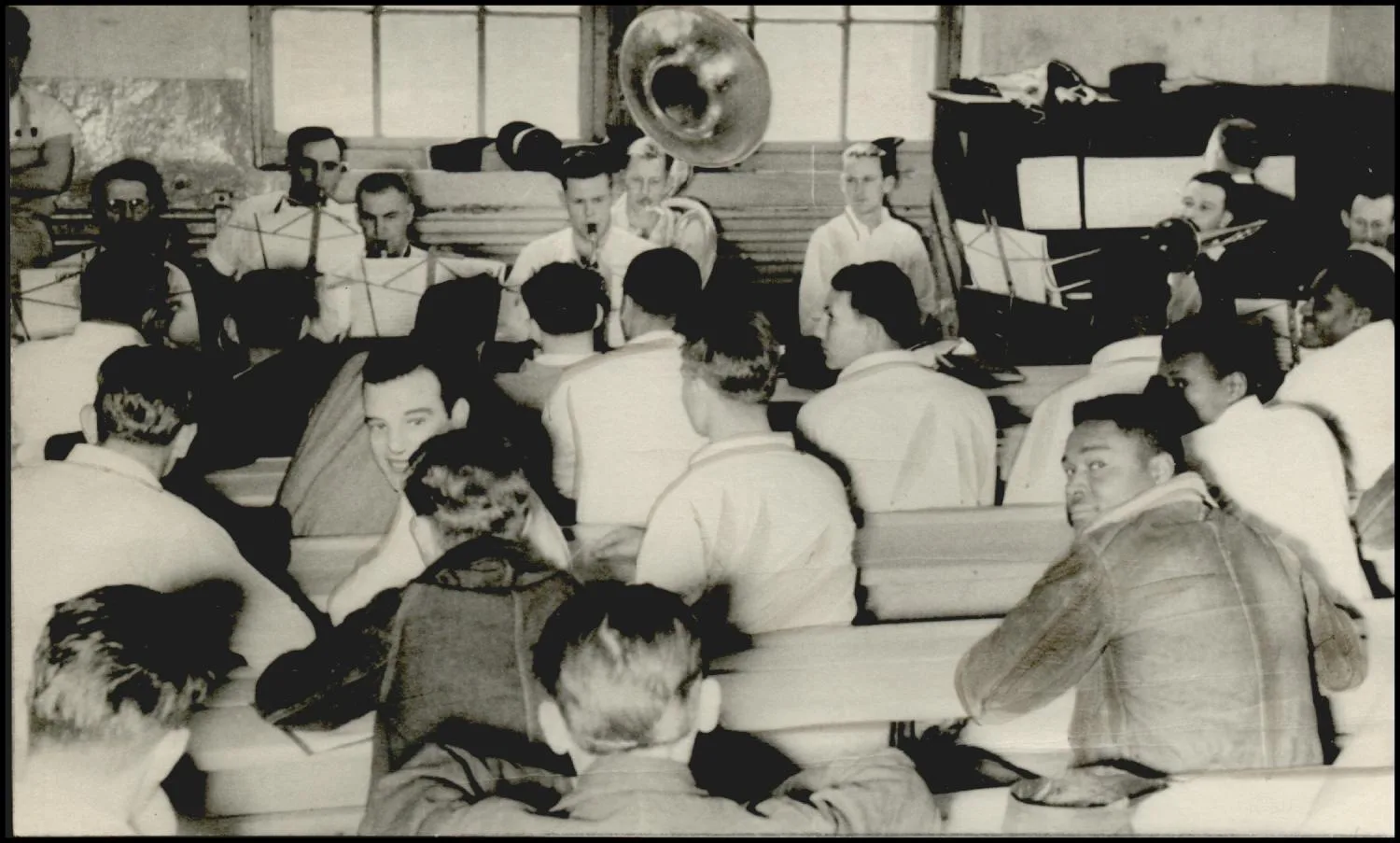 Photograph used for a story in the Oklahoma Times newspaper. Caption: "Proud of its orchestra is the prison."