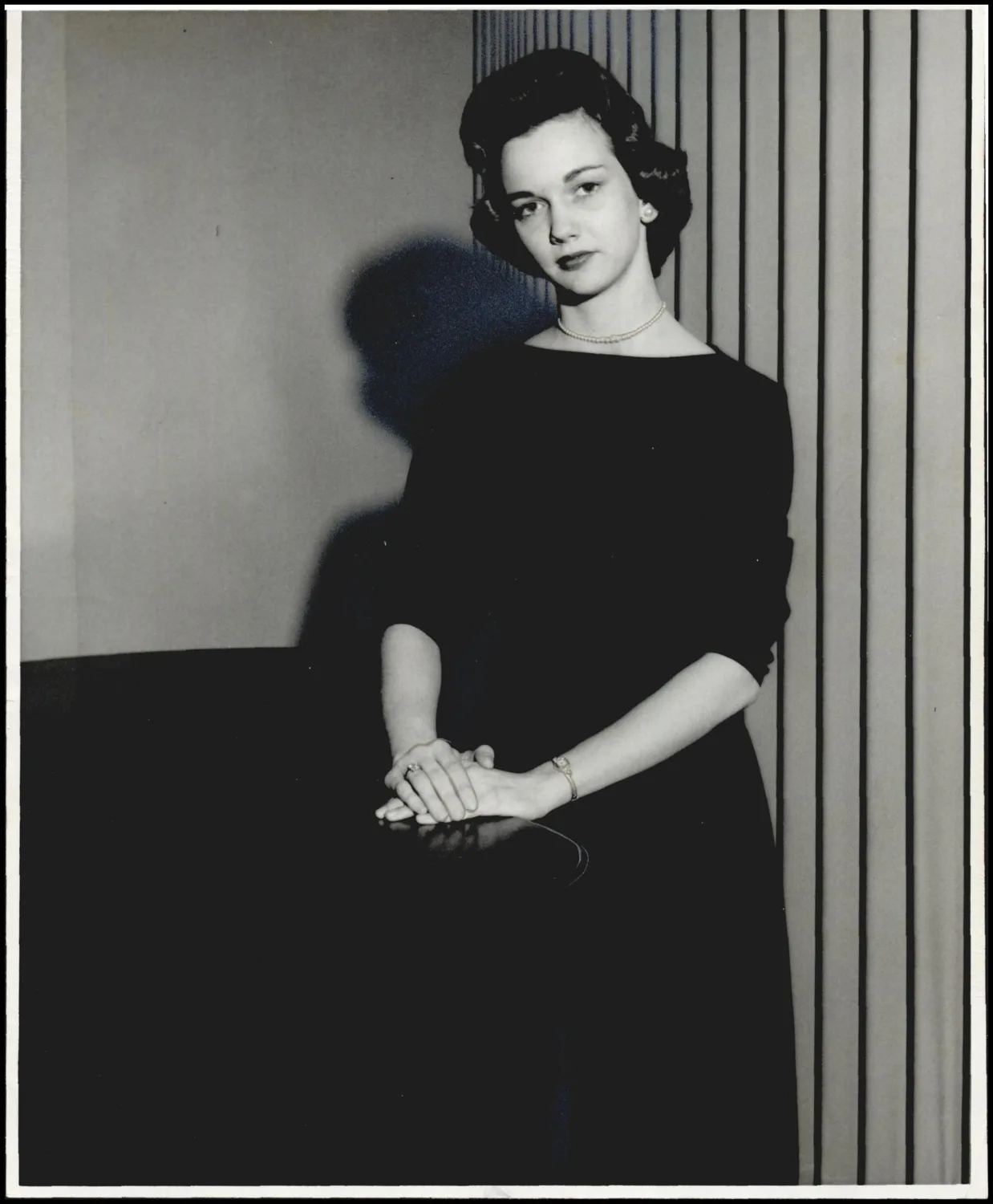Photograph used for a story in the Oklahoma Times newspaper. Caption: "Soloist for the Yahnseh band spring concert at Oklahoma Baptist University is Mary Ann Thompson, sophomore piano major from Durant."