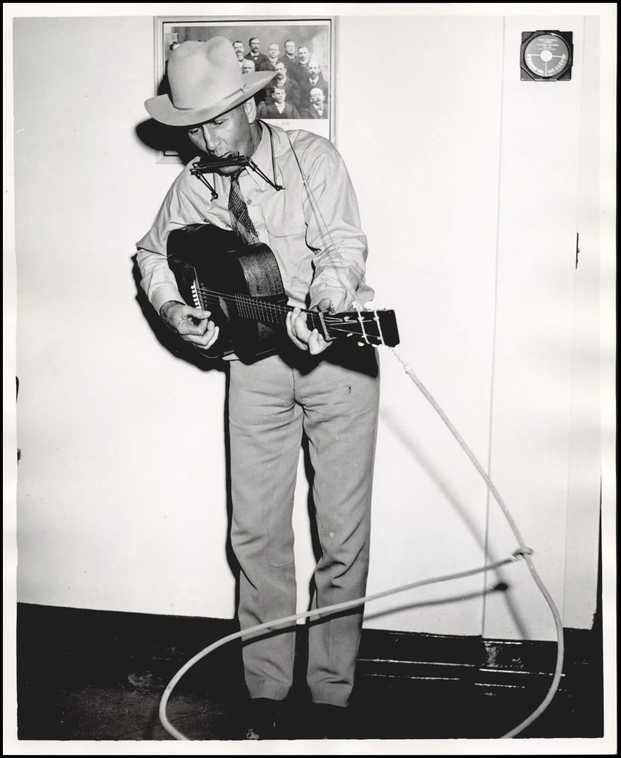 Photograph used for a newspaper owned by the Oklahoma Publishing Company. Caption: "Jack Webb Musician"