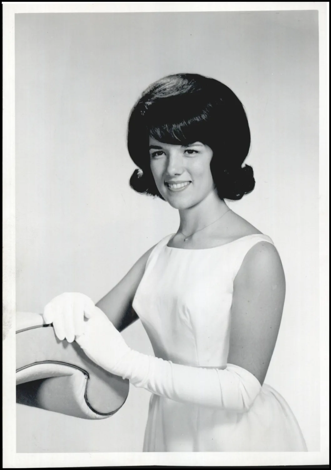 Photograph used for a story in the Oklahoma Times newspaper. Caption: "Coronation of Brenda Walker, as band queen at Okemah High School is scheduled Friday night between halves of the Okemah-Bristow football game."
