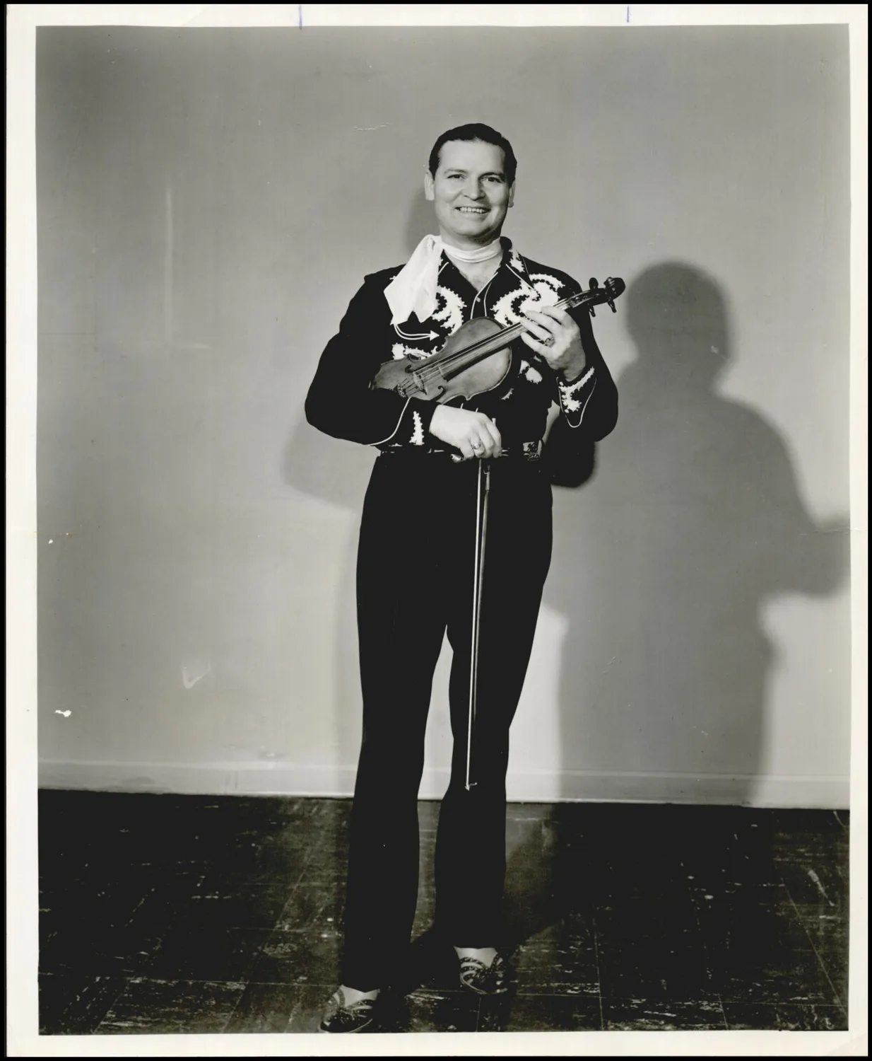 Photograph used for a story in the Daily Oklahoman newspaper. Caption: "Johnny Lee Wills / Musician"