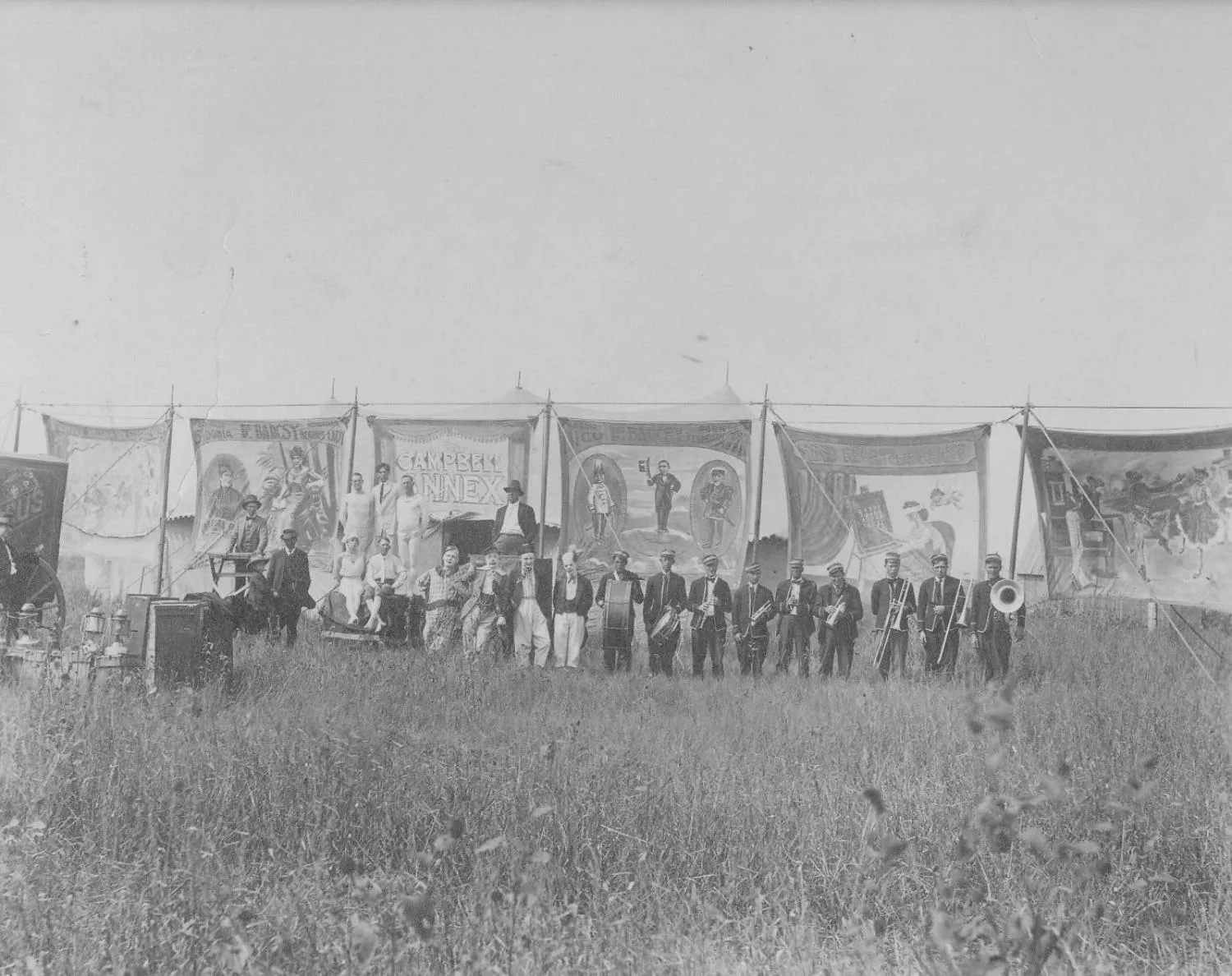Campbell Bros. Circus- side show banners, band, performers, DeBarcsy family, Little Nick.